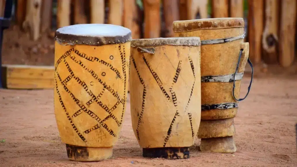 African Drums from Unsplash - https://unsplash.com/photos/brown-wooden-barrels-on-brown-sand-SPQ9KGO33i0 for Sound Therapy and African Drumming for Mental Clarity article