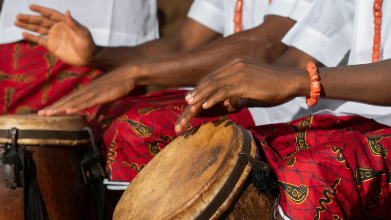 Close up hands playing African drums