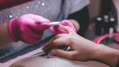 Lady getting manicure