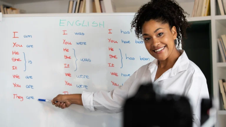 Medium shot smiley woman teaching