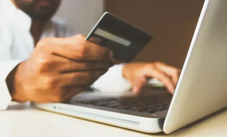 Stock photo of the Business Man with a credit card by rupixen - online banking
