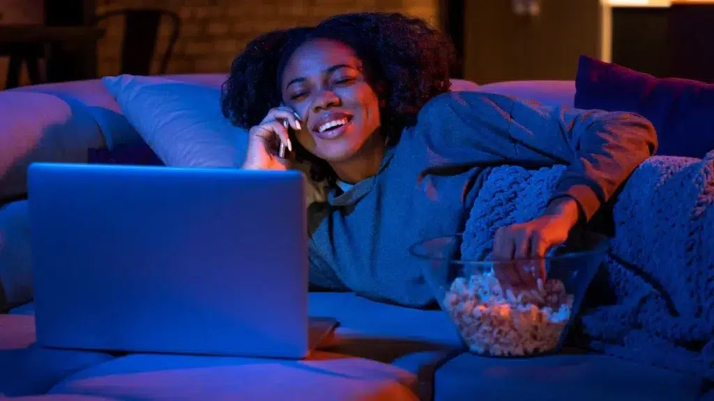 Streaming Lady with Popcoorn - The Best DStv Alternatives in South Africa: Affordable and Diverse Streaming Options