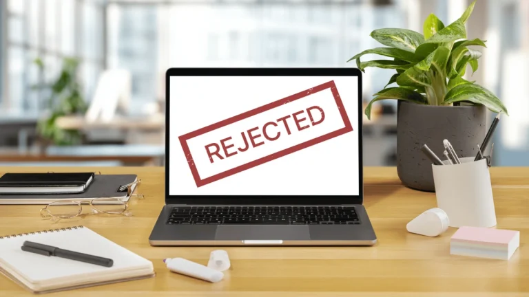 Rejected stamp on laptop screen