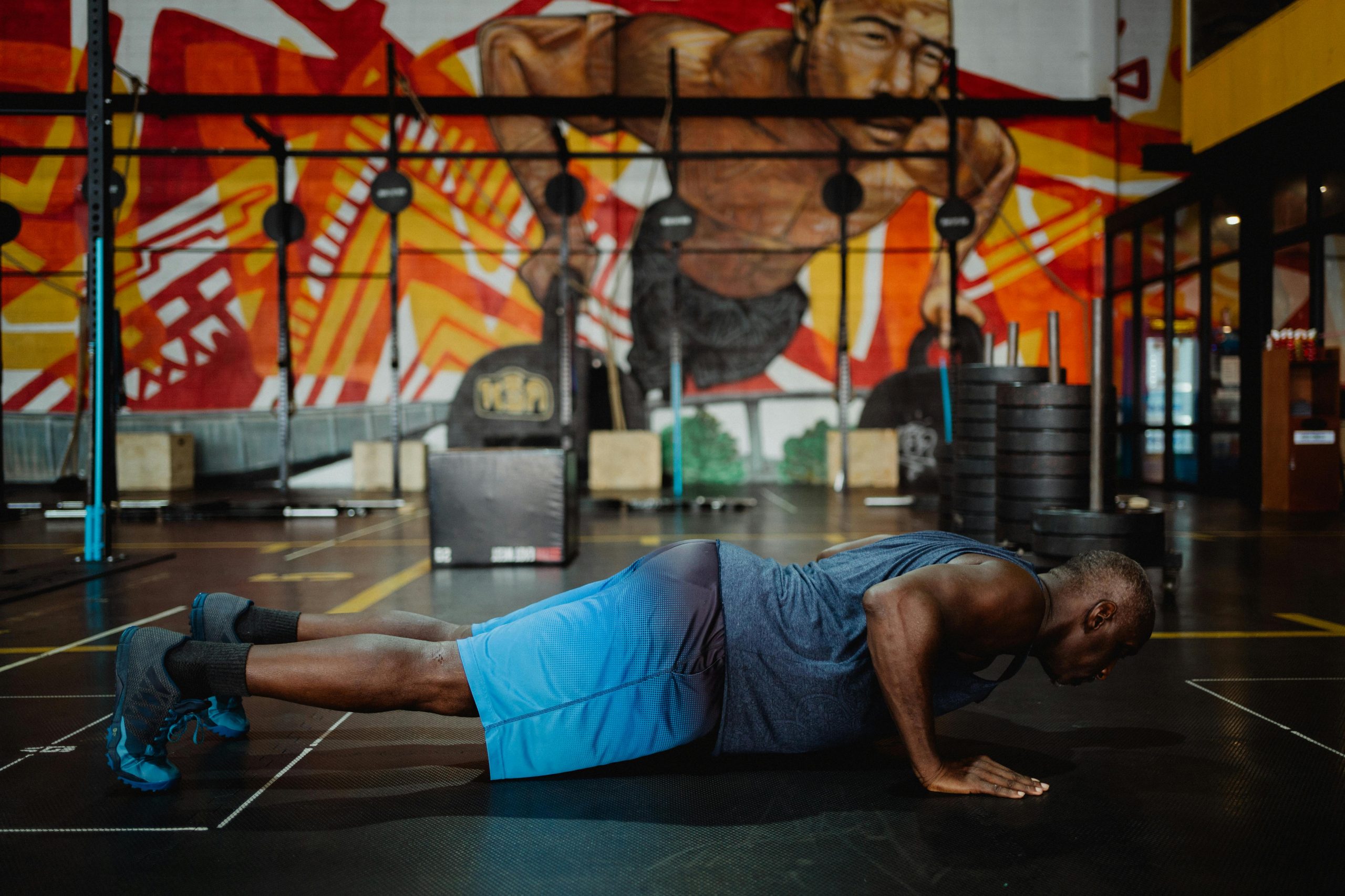 Man in Gray Tank Top Doing Push Up from Pexels