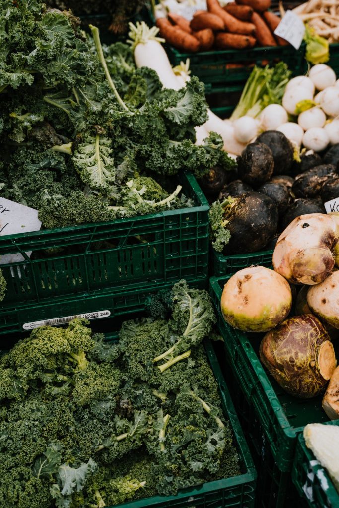 Fresh vegetables in crates at a market
