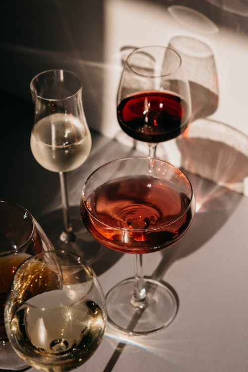 Clear Wine Glass With Red Wine, White wine, and Rose - Pexels Polina