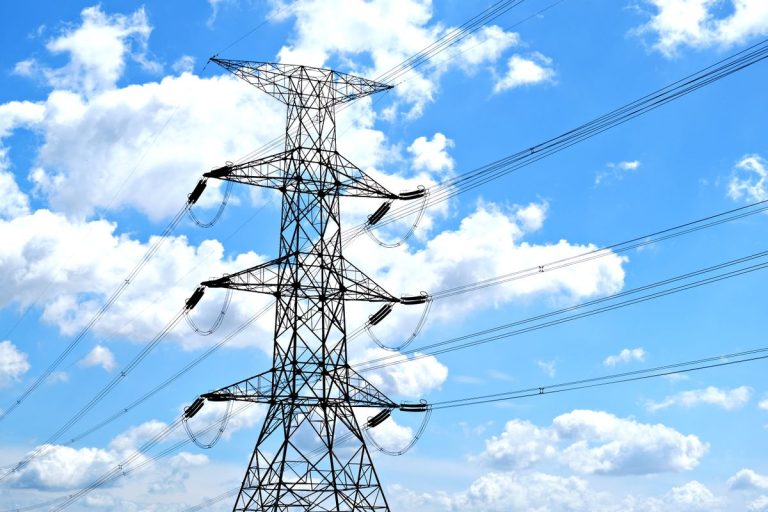 City Power Takes Control of Electricity Billing in Joburg: All You Need to Know Electricity pylon and power lines against a blue sky