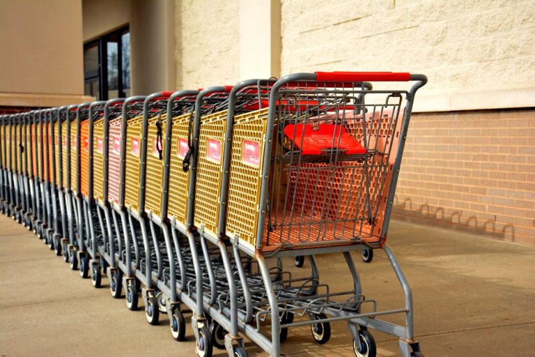 Mr D vs Uber Eats: Which Food Delivery Service Is Best for You? Row of shopping trolleys outside a store