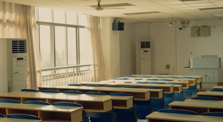 GDE Admissions Close Friday, 29 August 2025 – Apply Before Midnight! Rows of desks in an empty classroom