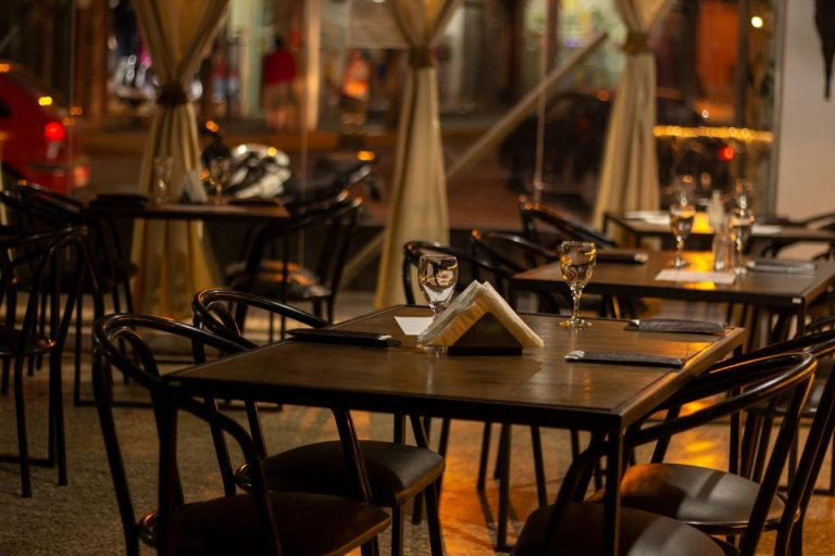 Propaganda Pretoria Restaurant Review: A Must‑Visit Dining Spot in the Capital Set tables in an empty restaurant