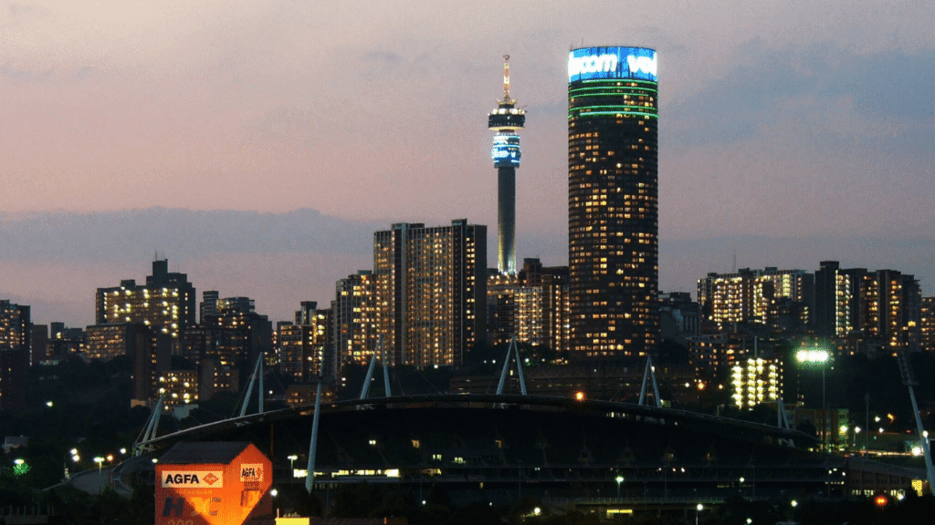 Johannesburg landscape at night with city lights, captured by Chris7cn, showcasing Gauteng's nightlife.