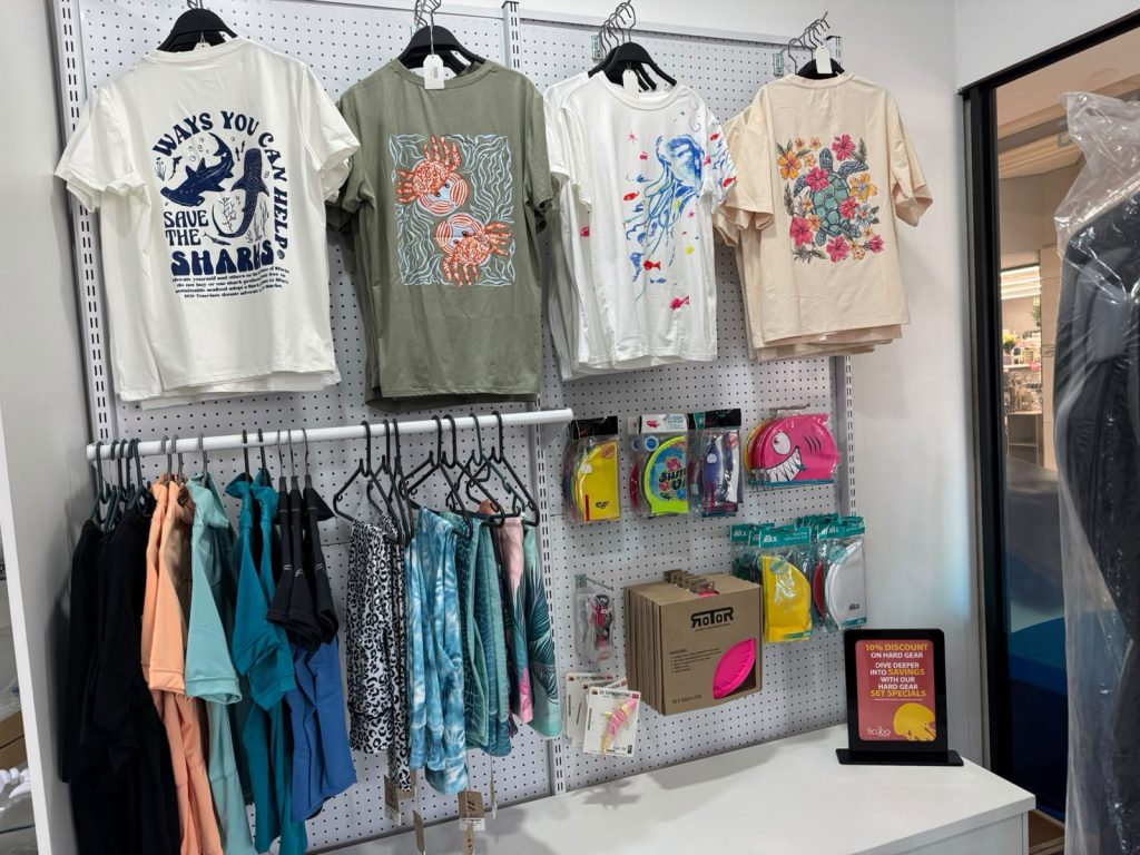 Ocean-themed T-shirts and swimwear at Scuba Evolution