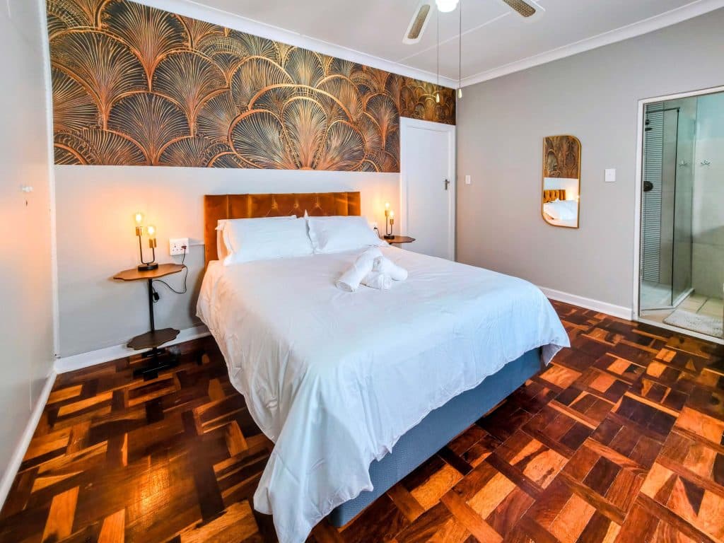 En-suite bedroom at Tau Golden Mane Guest House